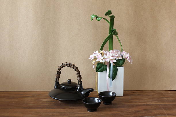japanese tea pot and cup on wooden background