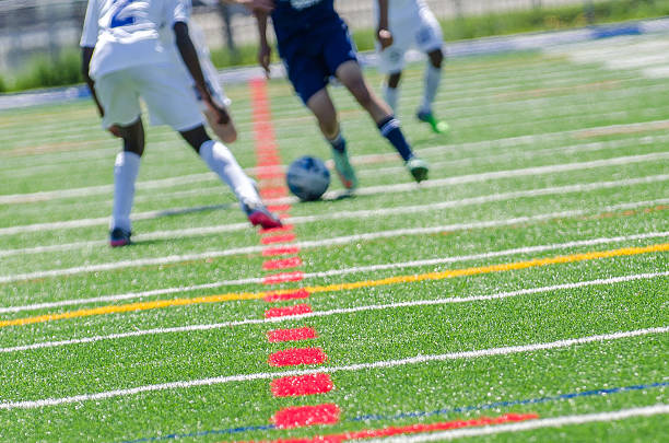 istock Blurred soccer players in action 476518900