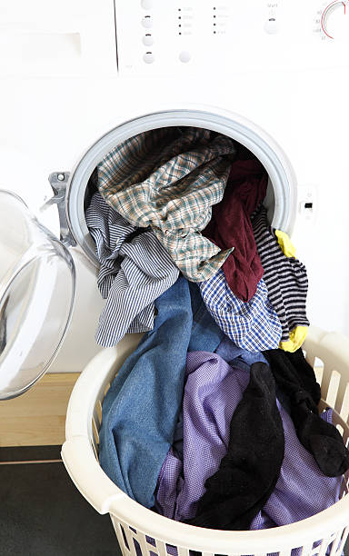 istock washing washine and laundry 476519062
