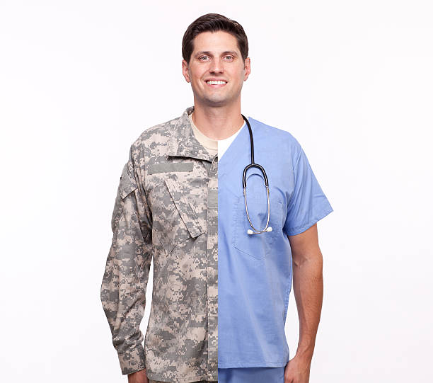 young man with split careers male nurse and soldier stock photo