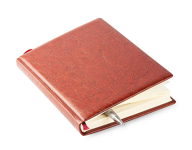 istock Diary with a brown leather cover and pen 476528972