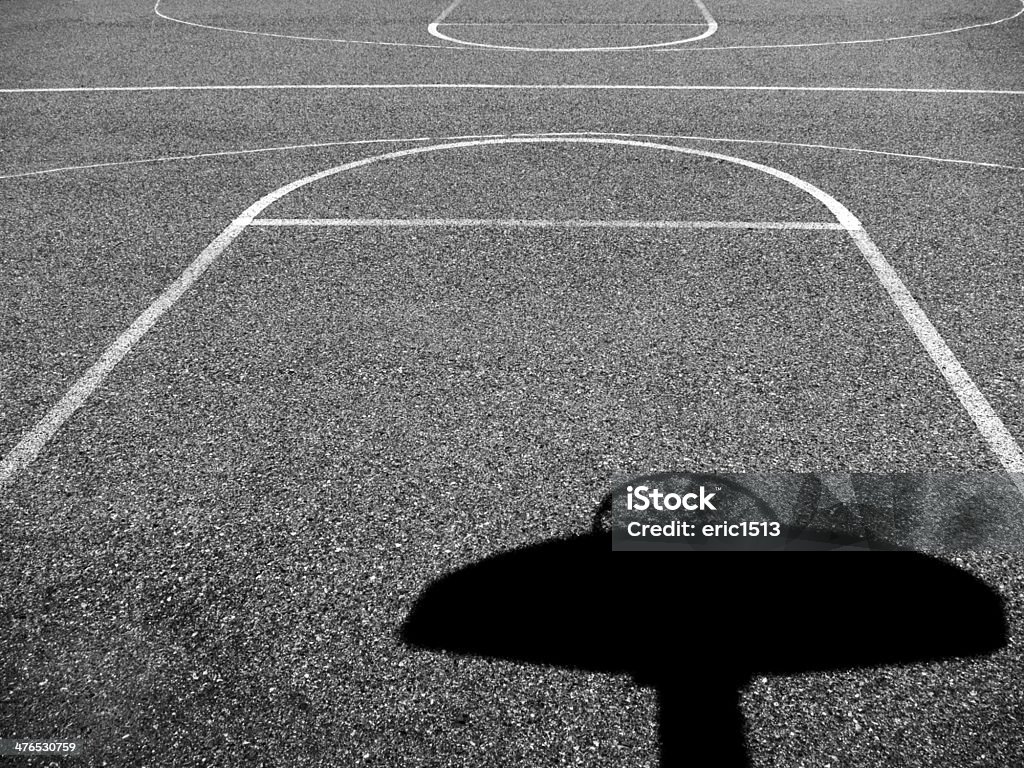 Urban Basketball Court Urban basketball court in neighborhood with old buildings Basketball - Sport Stock Photo