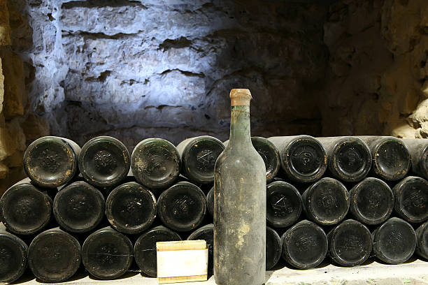 istock Old bottle wine in the cellar  the winery Ancient wine 476531414