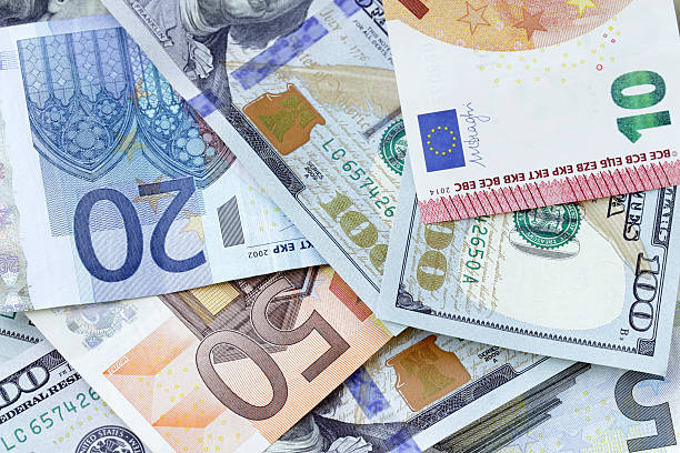 istock Money background - US dollars and euro banknotes 476532692