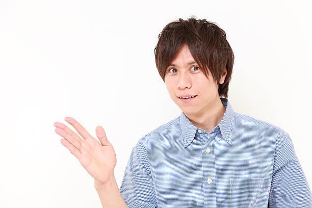 istock Japanese man presenting and showing something 476535895