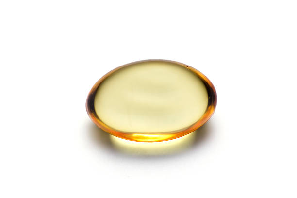 Capsule Omega 3 Capsule on white. cod liver oil fish oil vitamin a pill stock pictures, royalty-free photos & images