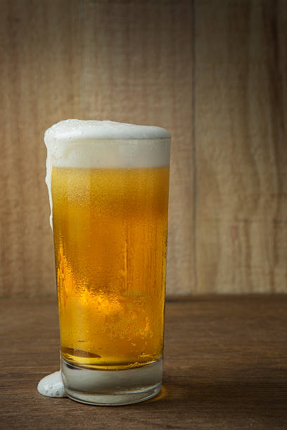 istock Beer Glass on a Wooden Background 476539598