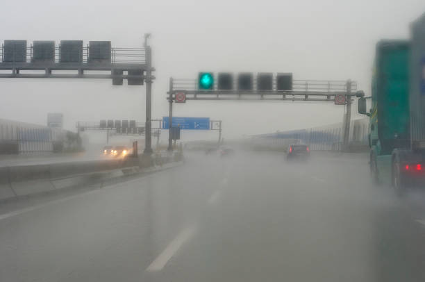 istock poor visibility due to heavy rain on the highway 476540365