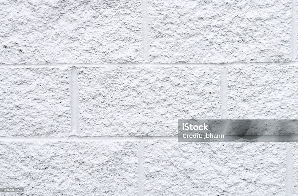 Texture muro di blocchi di cemento bianco - Foto stock royalty-free di Arancione