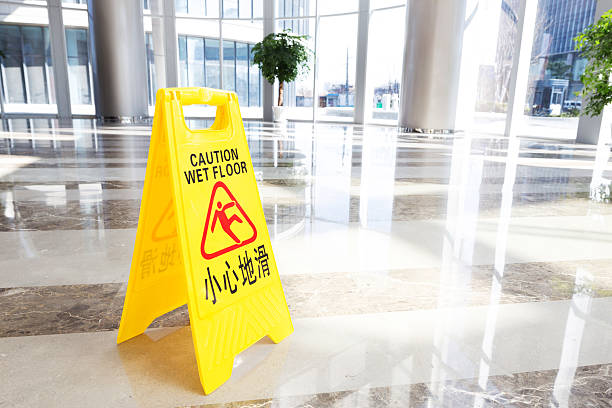 istock hallway with a caution sign in English 476541333