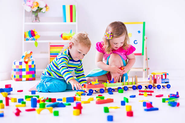 istock Little kids playing at day care 476541544