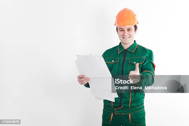 Construction Worker With Blueprint In One Hand And Thumb Up Stock Photo - Download Image Now