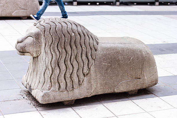 Stone figure of a lion on Drottninggatan street, Stockholm