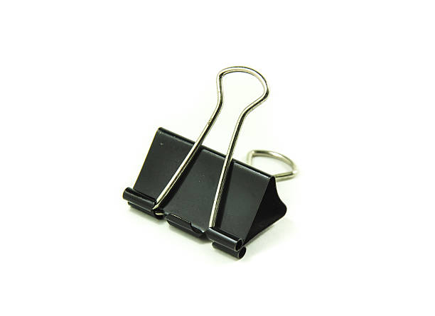 istock Black metal paperclips isolated on white background 476545914