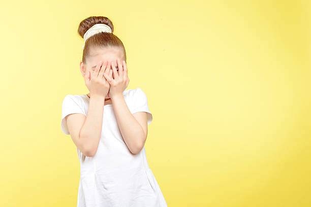istock Small girl showing different emotions 476547120