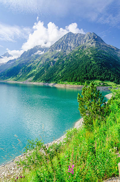 istock Azure mountain lake and high Alpine peaks, Austria 476549048