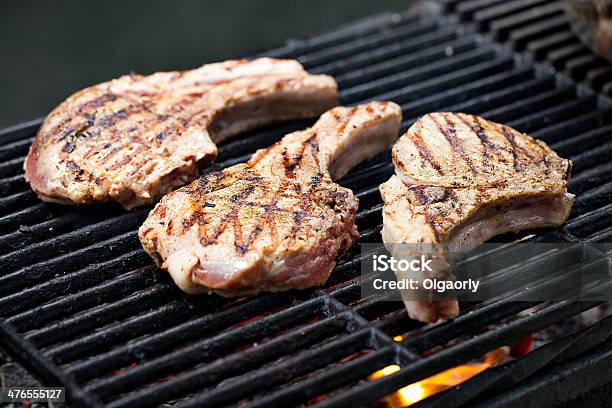 Pork Chops On Grill Stock Photo - Download Image Now - Barbecue - Meal, Barbecue Grill, Char-Grilled