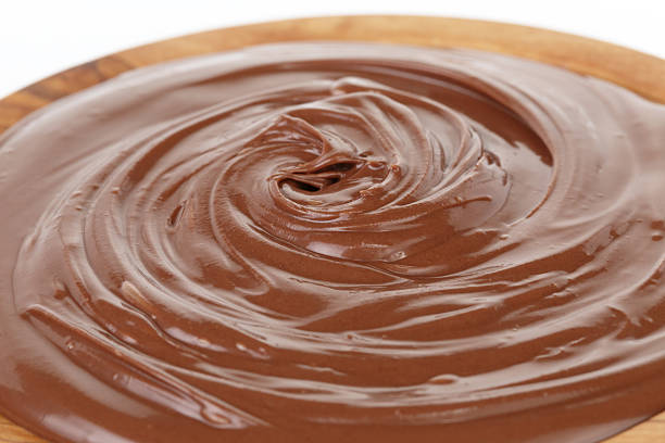 istock chocolate hazelnut cream in wood bowl 476558132