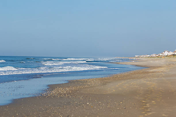 Beach at Emerald Isle Morning at the beach in Emerald Isle, North Carolina. emerald isle north carolina stock pictures, royalty-free photos & images