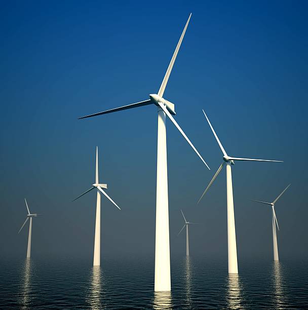 istock 3d wind turbines producing energy in sea 476561211