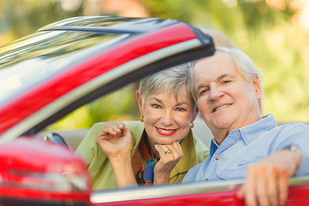 istock senior couple in a car 476561623