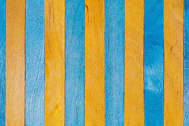 istock Old blue and yellow wooden board background. 476566458