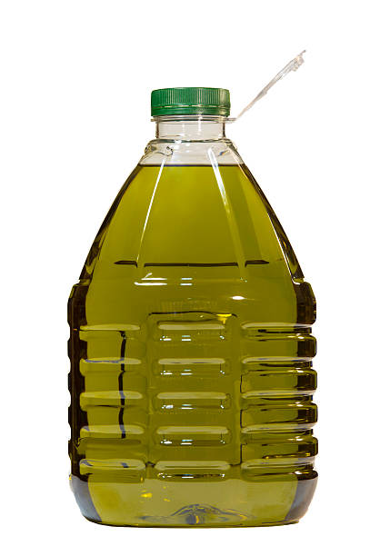 bottiglia di olio d'oliva isolato su sfondo bianco - decanter foto e immagini stock