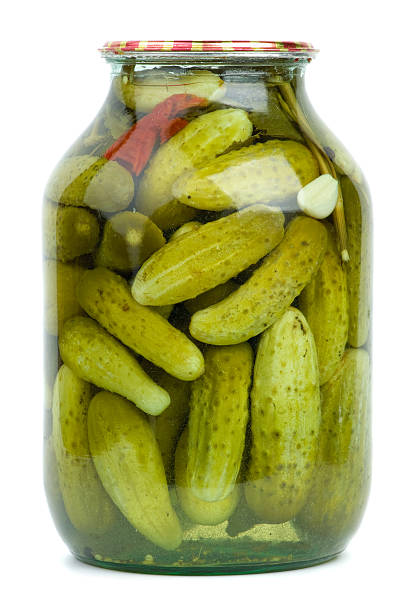istock Big glass jar with home-made marinated cucumbers 476567823
