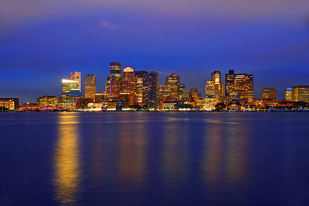 istock Boston skyline at sunset and river in Massachusetts 476568364