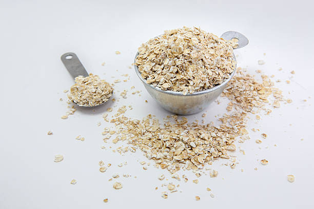 istock oatmeal in Stainless cup 476569027