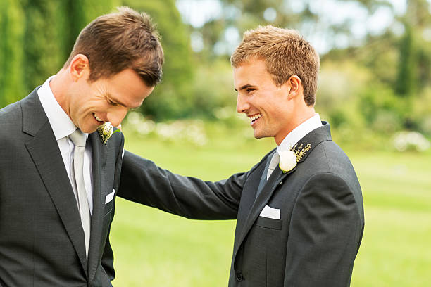 istock Best Man Looking At Groom In Garden 476569273