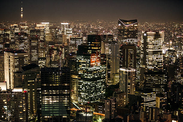 istock Tokyo business buildings at night 476572346