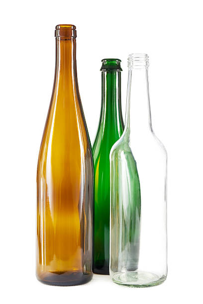 istock Brown, green and white glass bottles 476572897