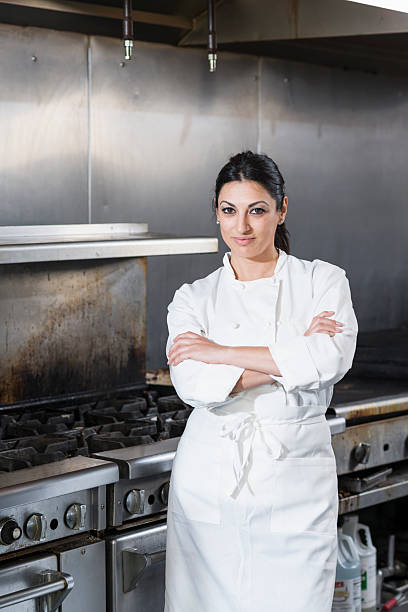 istock Female chef in a commercial kitchen 476586154