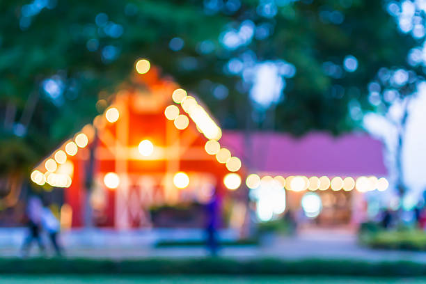 istock blurred background : Outdoor home at night with bokeh light. 476587192