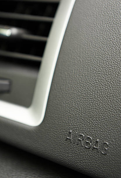 istock Close Up Of Airbag Notice On Car Dashboard 476588220