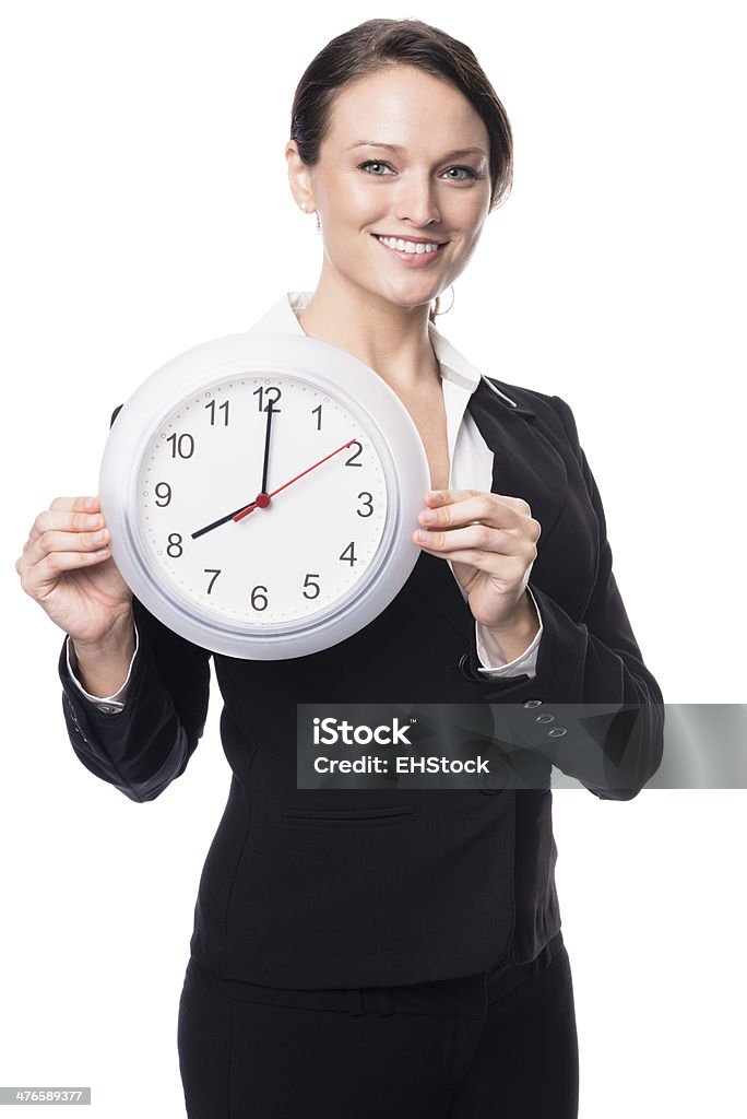 Joven empresaria con reloj despertador aislado sobre fondo blanco - Foto de stock de Reloj libre de derechos