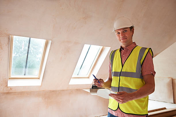 istock Building Inspector Looking At New Property 476592802