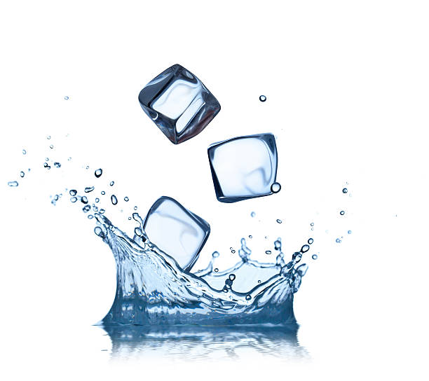 istock Ice cubes in water splashes isolated on white 476593600