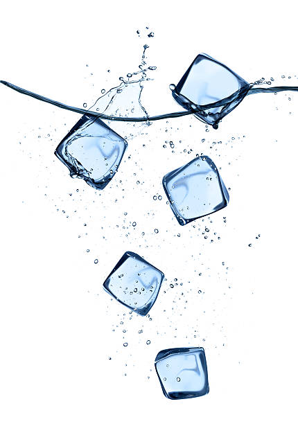 istock Ice cubes in water splashes isolated on white 476593612