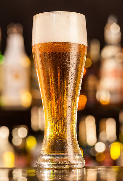 istock Jug of beer served on bar counter 476595330