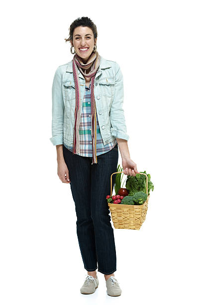 istock Happy woman with groceries 476598378