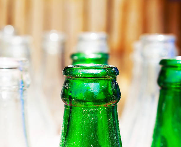 istock Fresh alcohol drink in the bottles with green bottles 476598560