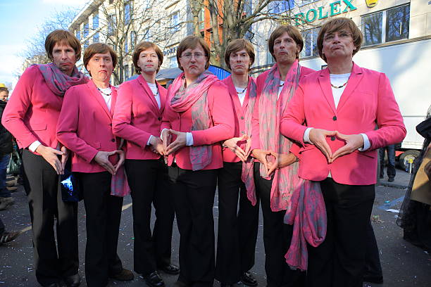 street carnival Angela Merkel parody stock photo