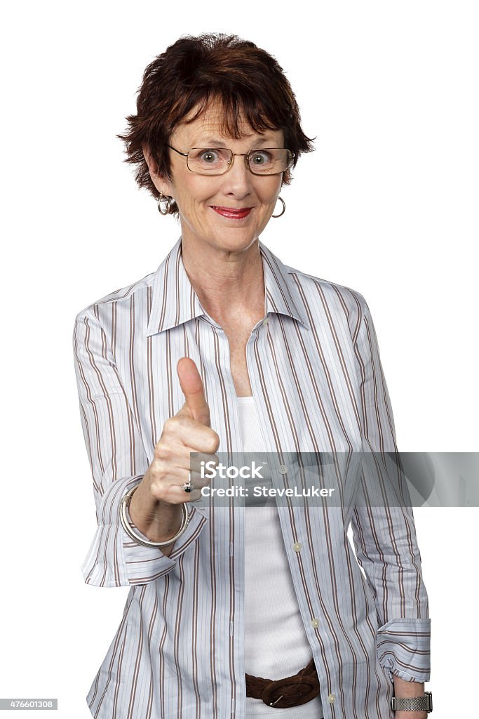 Giving her approval Smiling woman with her thumb up isolated on white. Cut Out Stock Photo