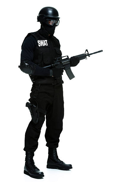 istock SWAT police standing with rifle 476602962