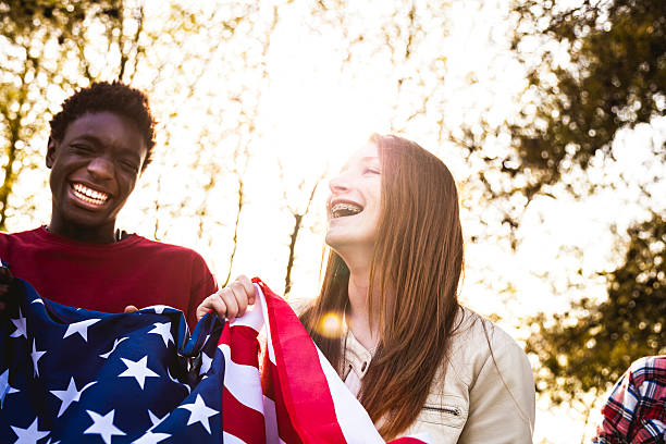 istock Teenagers with USA flag 476603924