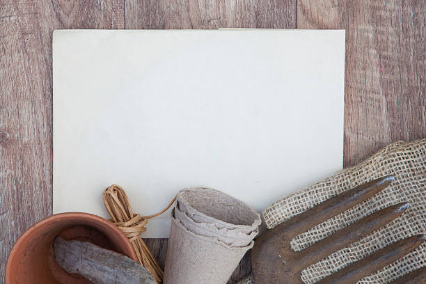 istock Gardening background with blank paper 476605608