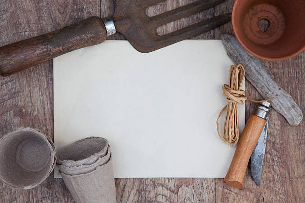istock Gardening background with blank paper 476605616