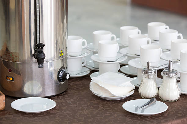 istock silver tea urn, white cup and saucer and sugar bowl 476608576